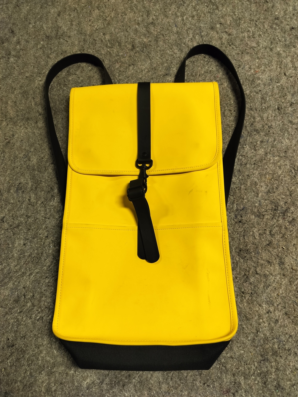 Rains Yellow Backpack with Black Trim and Strap